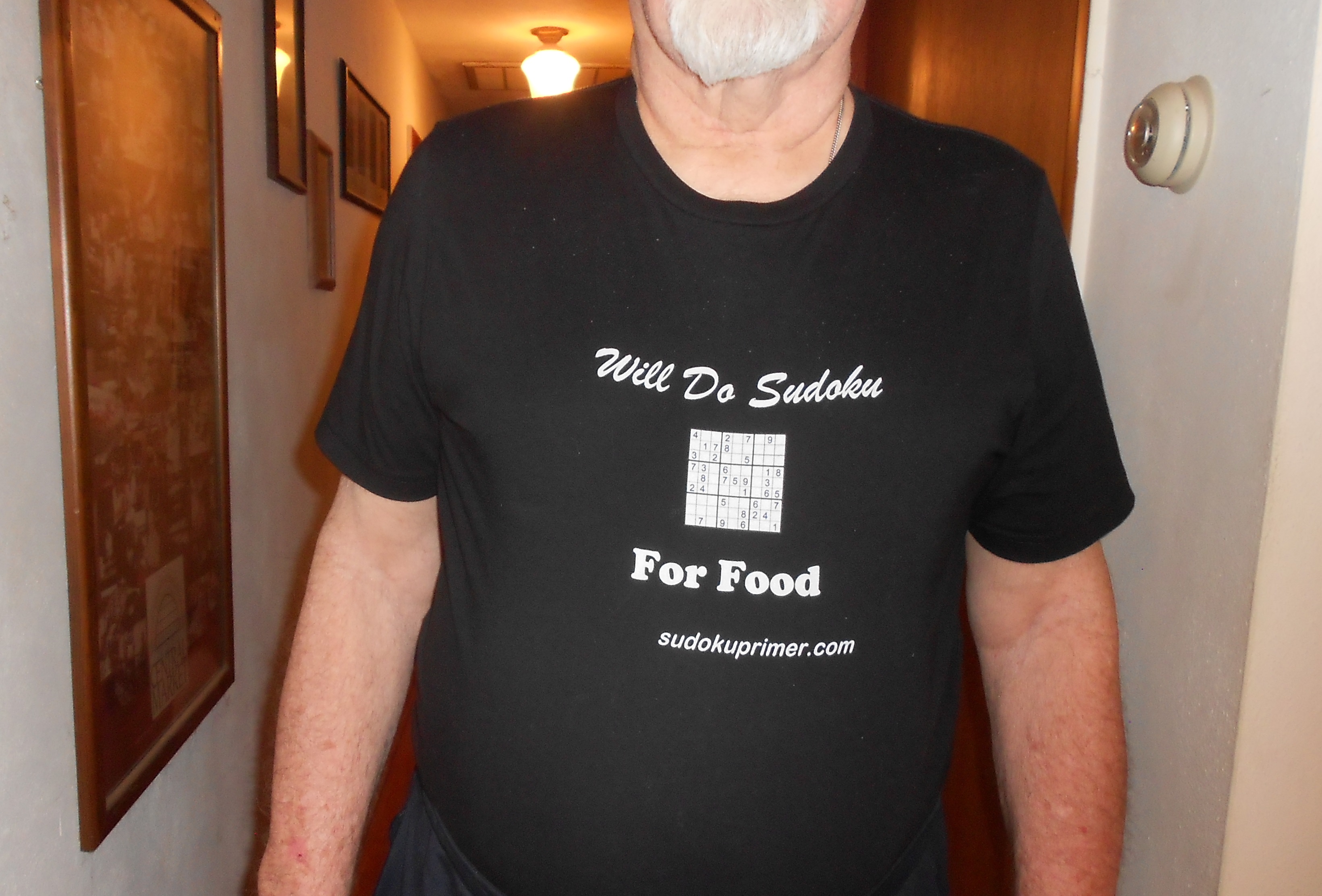 Picture of sudoku t-shirt contest winner in the shirt he won